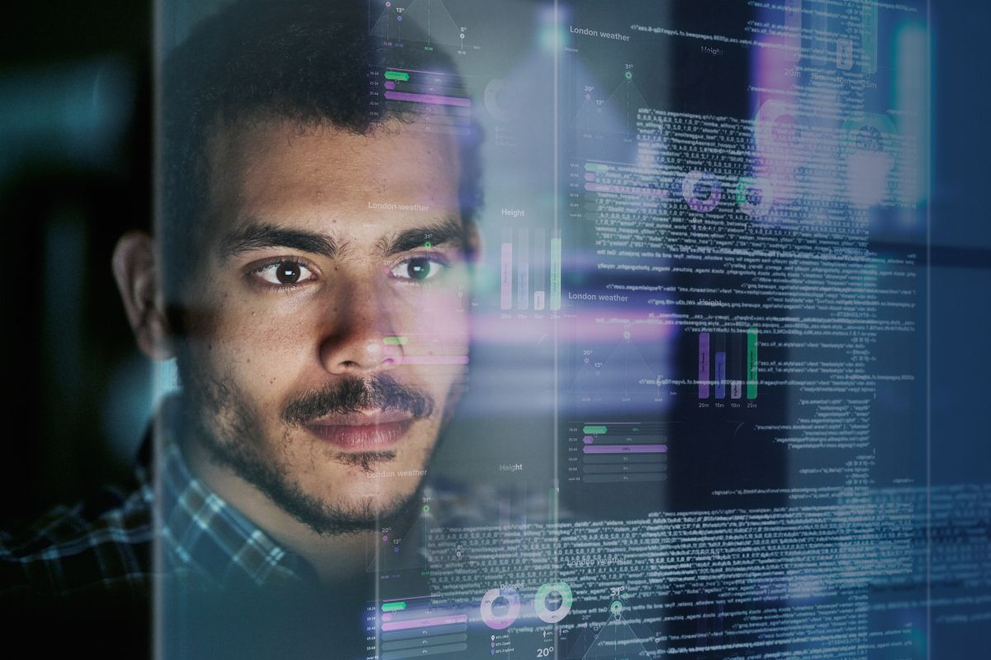 Man looking at a glass display